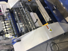 Máquina de coser de libros de hilo para taller de impresión digital